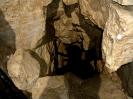X-Akten Höhle - Schatten des Herrn W. vor einer verlassenen Grabungsstelle in der Verbruchhalle.